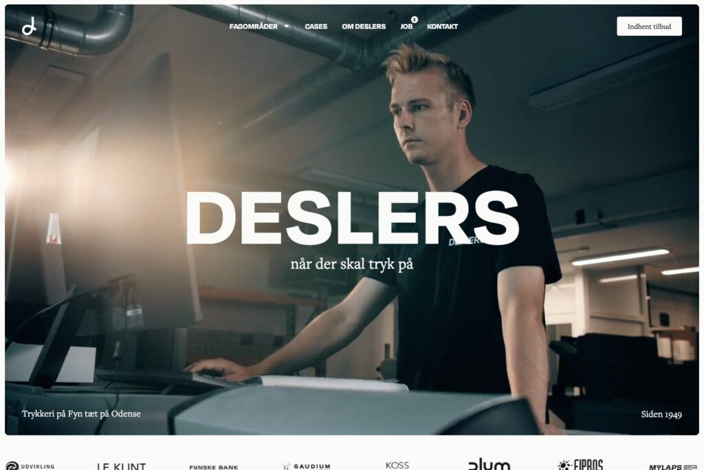 Forsiden på deslers.dk med film i baggrunden og det nye DESLERS-ordmærke